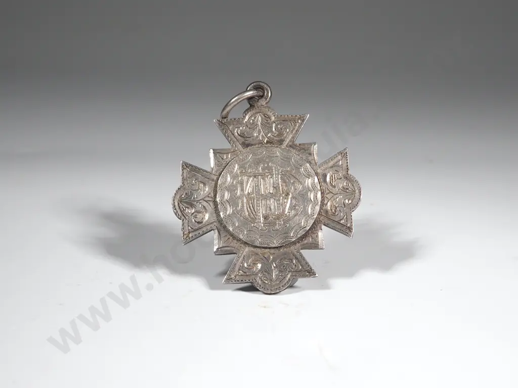 Sterling Silver NZ Made Prize Fob to Nellie Overend for Good Conduct & Attendance: Made by Hosie & Bell Wellington Image 1++