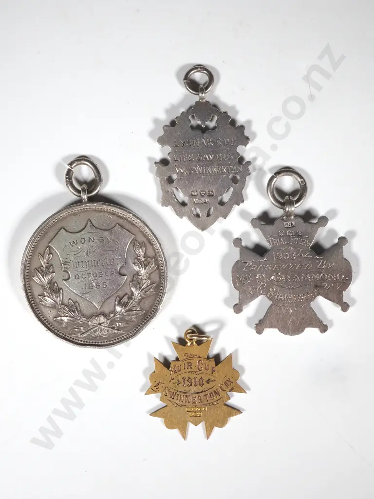Selection of Four Prize Fobs Awarded to E Swinnerton in Silver & Gold Image 1++