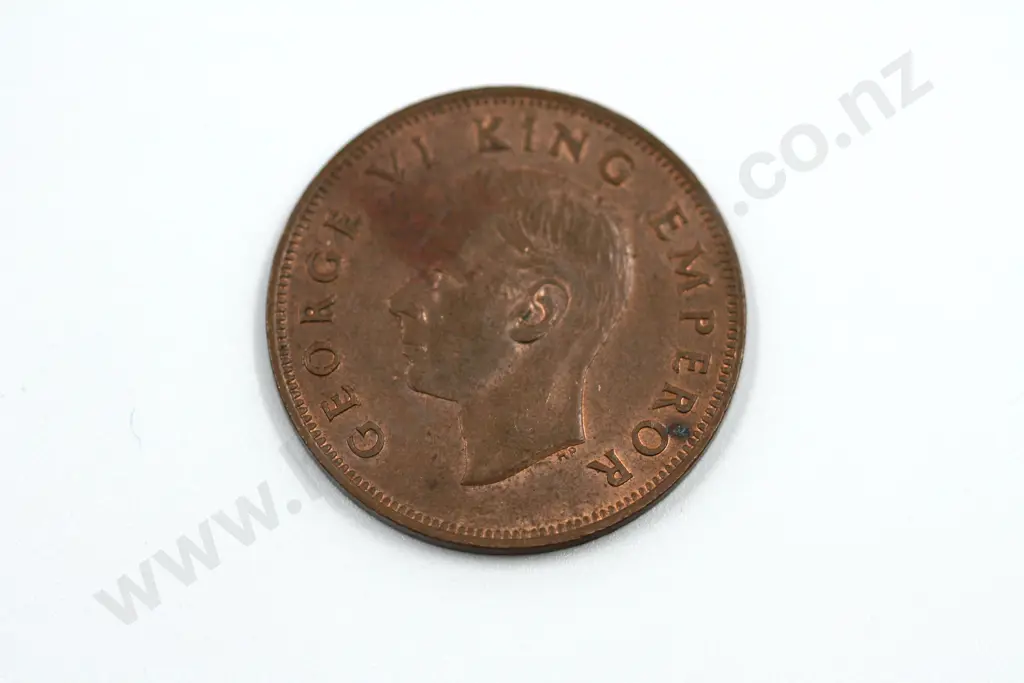 1942 one penny, almost uncirculated with mint lustre. C.V. $200 Image 1++