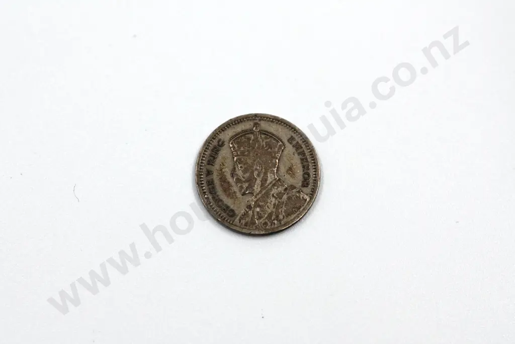 1935 threepence, average, circulated condition, heavily toned on obverse, dirty reverse. C.V. $210 Image 1++