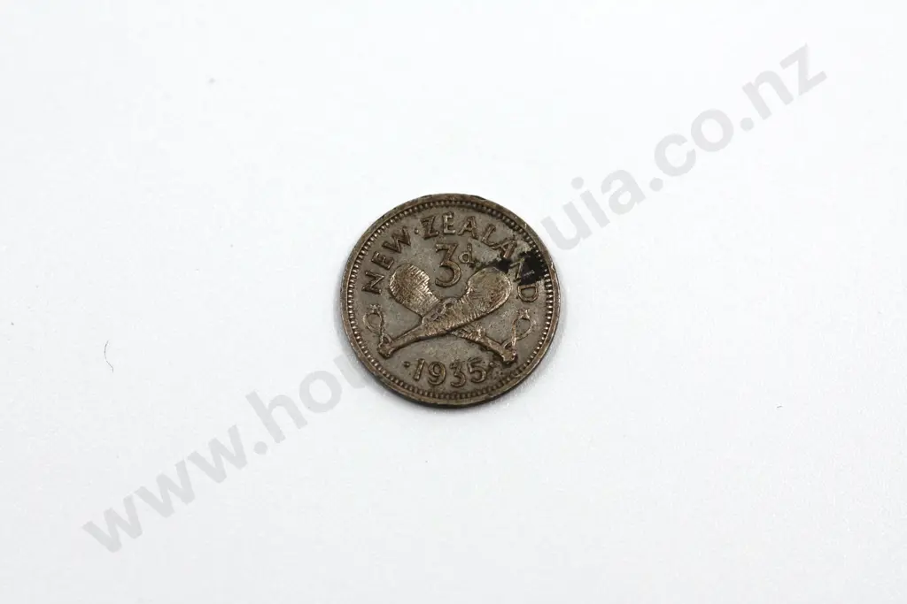 1935 threepence, average, circulated condition, heavily toned on obverse, dirty reverse. C.V. $210 Image 1++