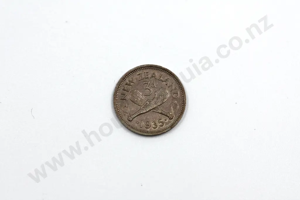 1935 threepence, very fine condition, eight clear pearls in the King’s crown. C.V. $400 Image 1++