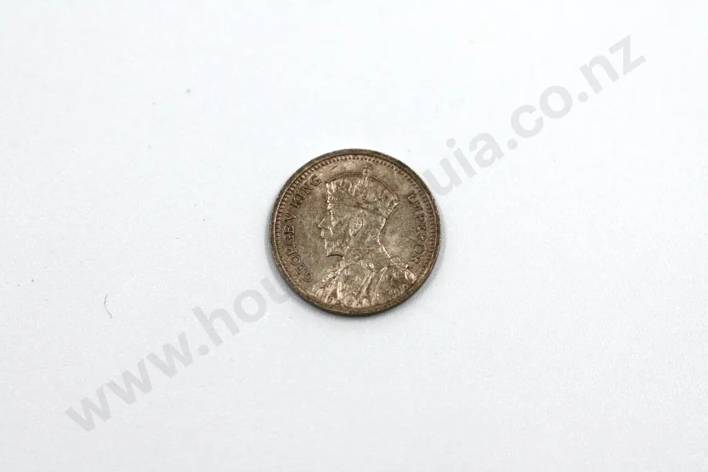 1936 threepence, uncirculated with full mint lustre but toned. C.V. $80 Image 1++