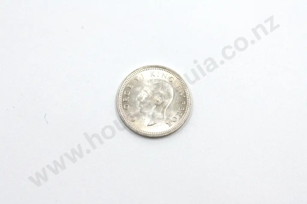 1942 threepence, brilliant uncirculated with full mint lustre. C.V. $65 Image 1++
