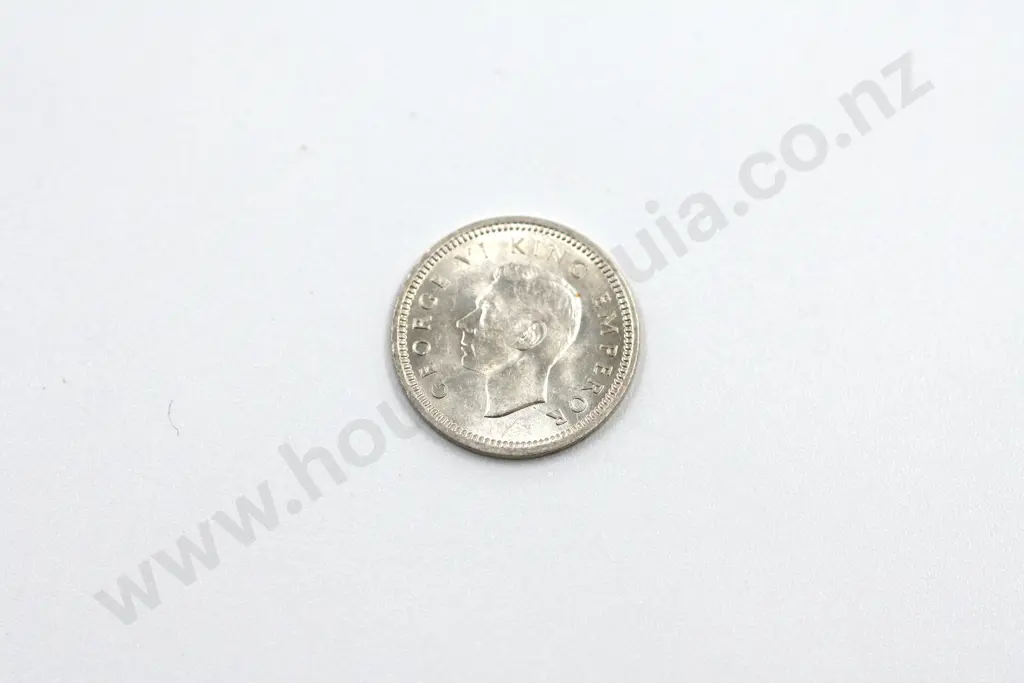 1944 threepence, brilliant uncirculated with full mint lustre. C.V. $55 Image 1++