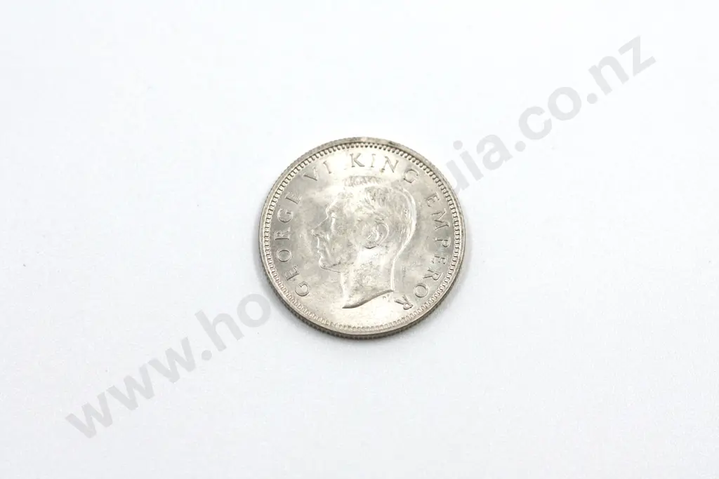 1937 sixpence, uncirculated with full mint lustre. C.V. $250 Image 1++