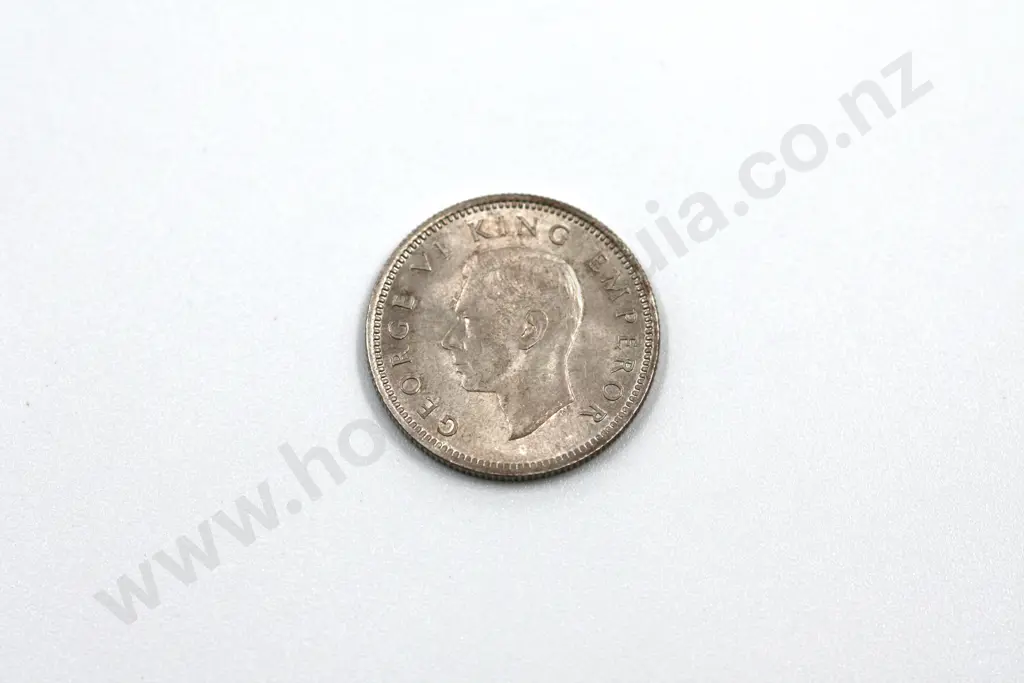 1939 sixpence, uncirculated. C.V. $400 Image 1++