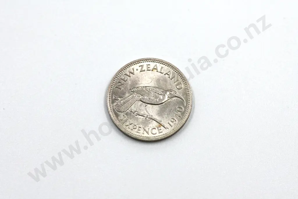1940 sixpence, uncirculated with full mint lustre, light toning on obverse. C.V. $400 Image 1++
