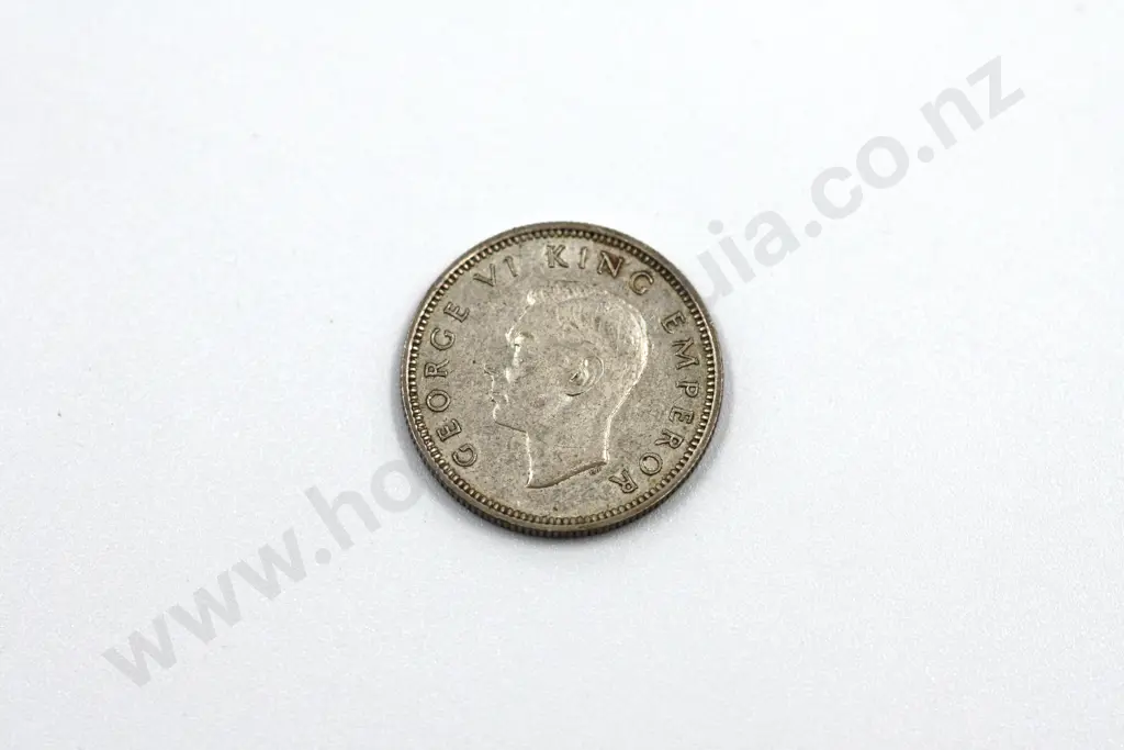 1941 sixpence, extremely fine. C.V. $300 Image 1++