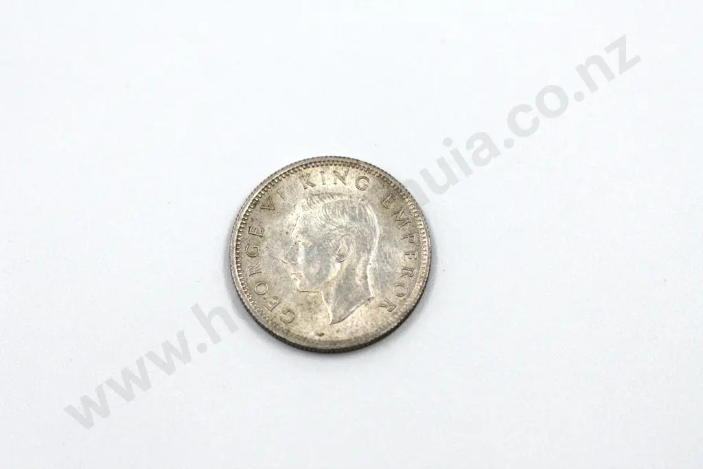 1942 sixpence, extremely fine. C.V. $250 Image 1++