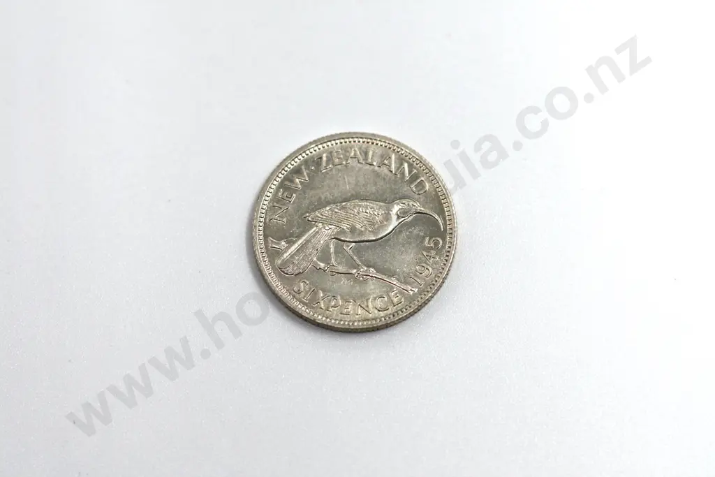 1945 sixpence, uncirculated with full mint lustre. C.V. $175 Image 1++