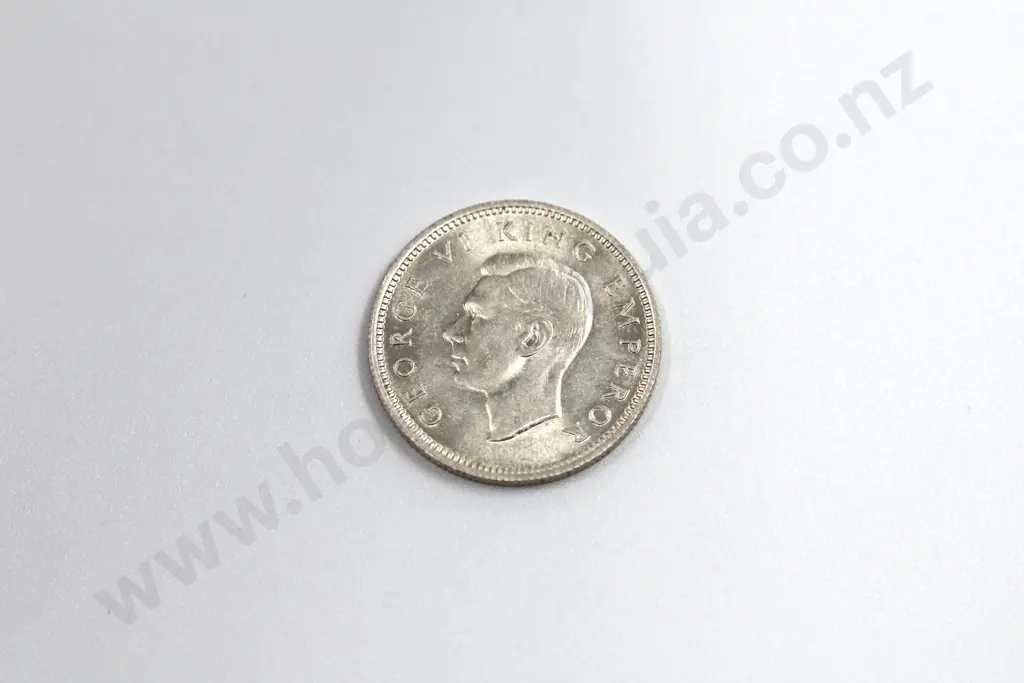 1945 sixpence, uncirculated with full mint lustre. C.V. $175 Image 1++