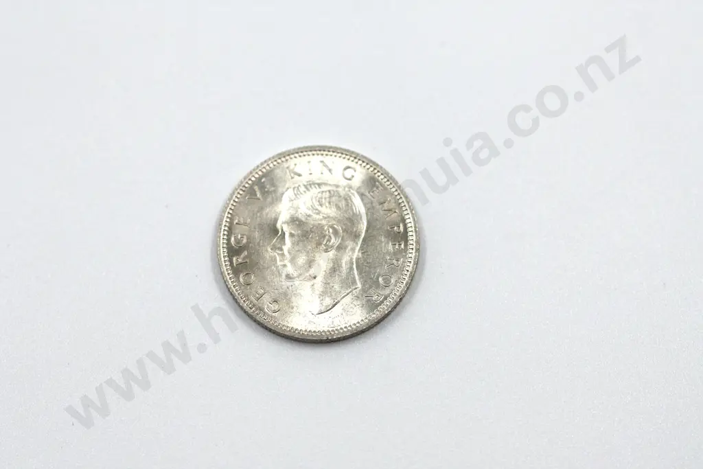 1946 sixpence, uncirculated with full mint lustre. C.V. $125 Image 1++