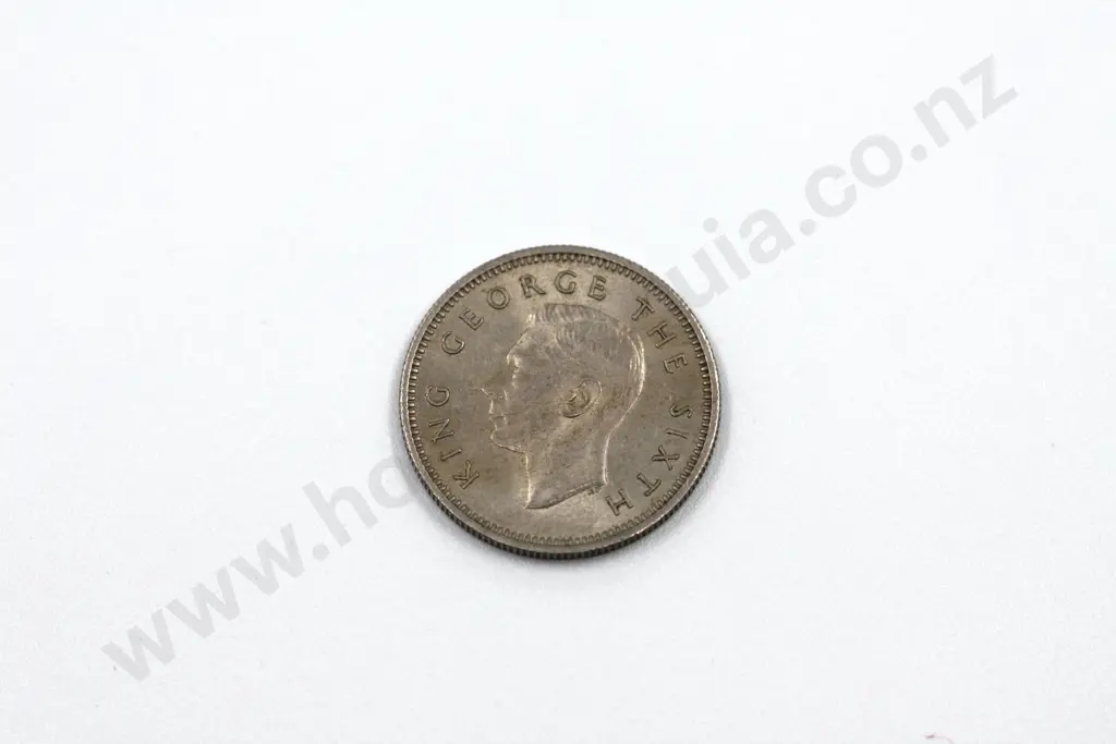 1950 sixpence, extremely fine. C.V. $200 Image 1++
