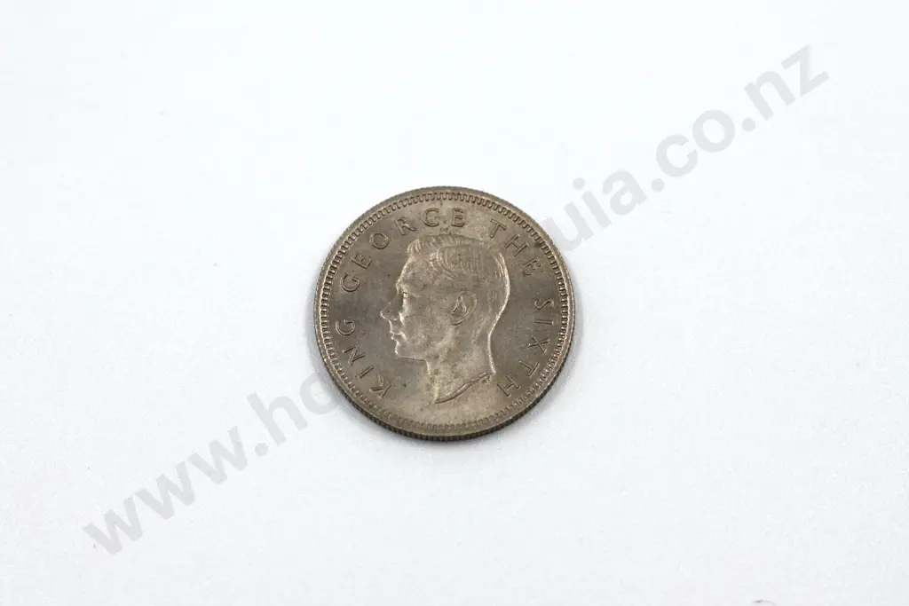 1952 sixpence, uncirculated. C.V. $100 Image 1++