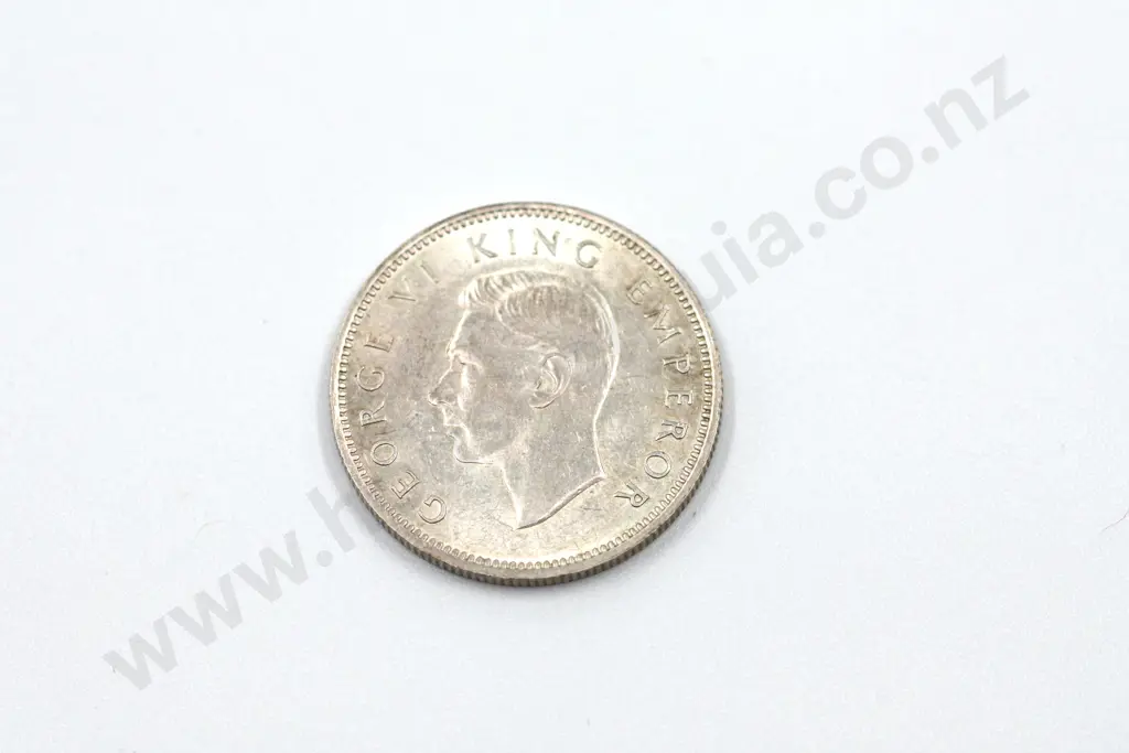 1943 shilling, uncirculated with mint lustre. C.V. $400 Image 1++