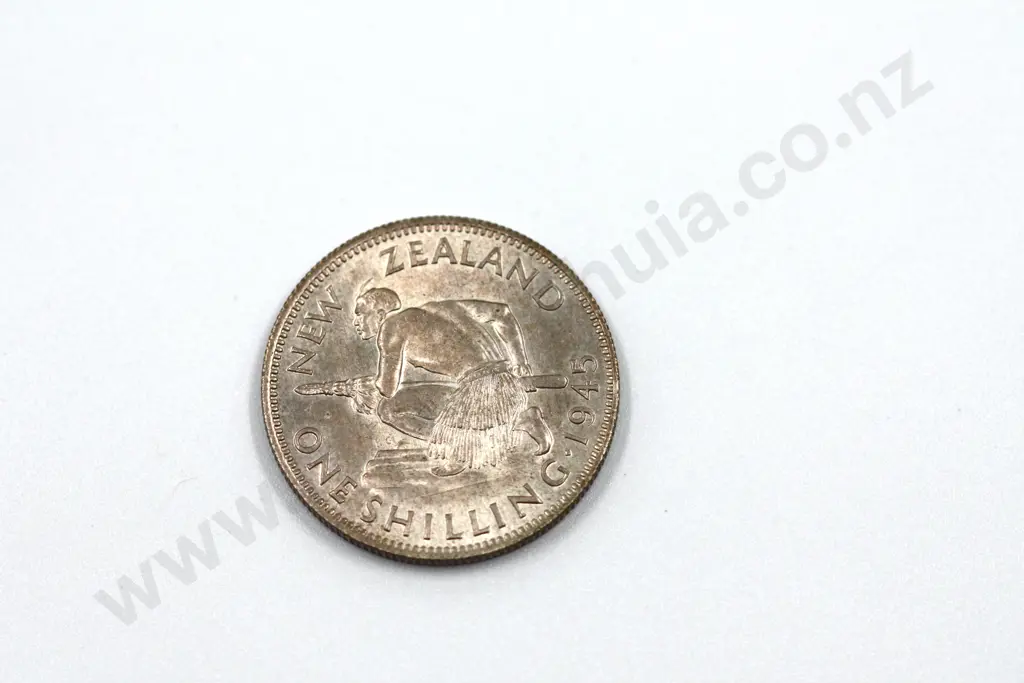 1945 shilling, brilliant uncirculated with full mint lustre, light toning. C.V. $225 Image 1++