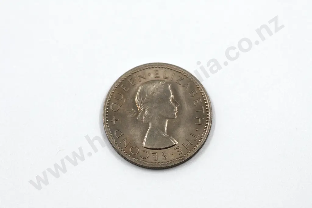 1953 shilling, uncirculated with mint lustre. C.V. $80 Image 1++