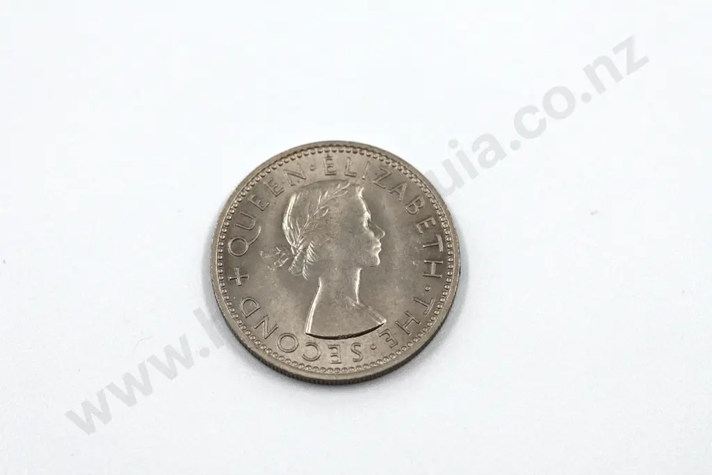 1955 shilling, brilliant uncirculated with full mint lustre. C.V. $600 Image 1++