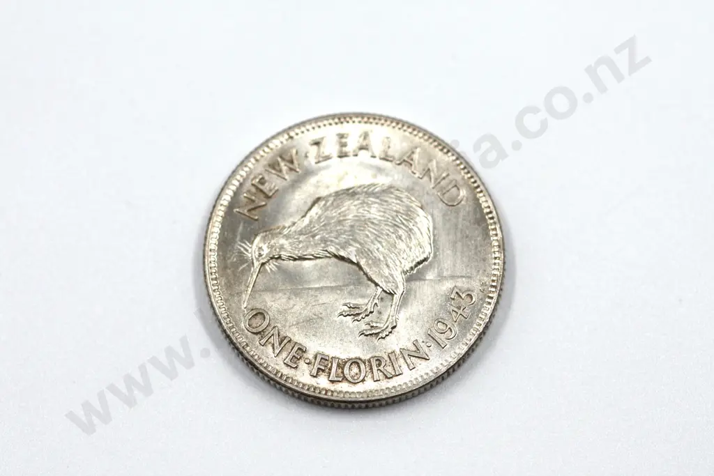 1943 florin, brilliant uncirculated with full mint lustre, light toning. C.V. $400 Image 1++