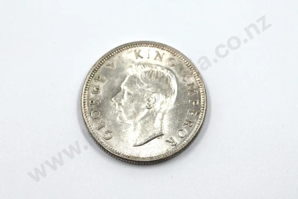 1943 florin, brilliant uncirculated with full mint lustre, light toning. C.V. $400 Image 1++