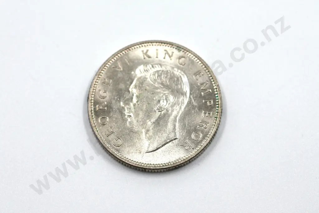 1945 florin, brilliant uncirculated with full mint lustre, light toning. C.V. $500 Image 1++