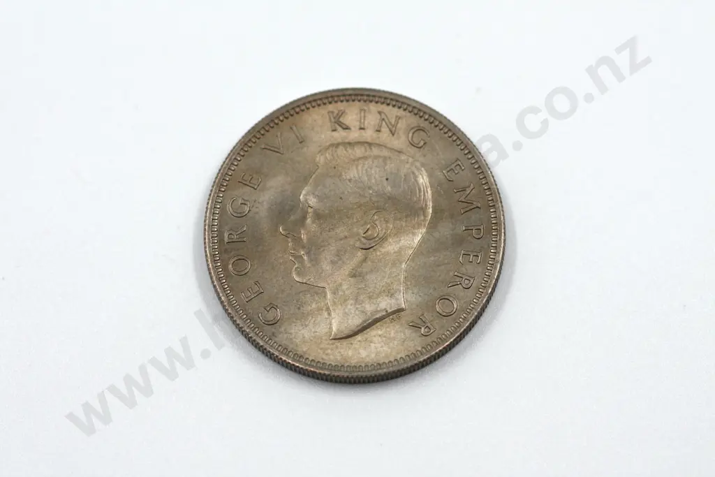 1947 florin, brilliant uncirculated with full mint lustre, streaky toning on the obverse. C.V. $600 Image 1++