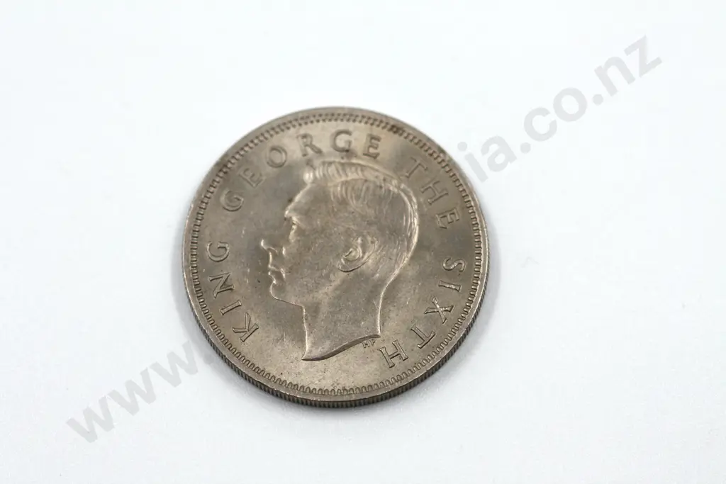 1950 florin, brilliant uncirculated with full mint lustre. C.V. $150 Image 1++