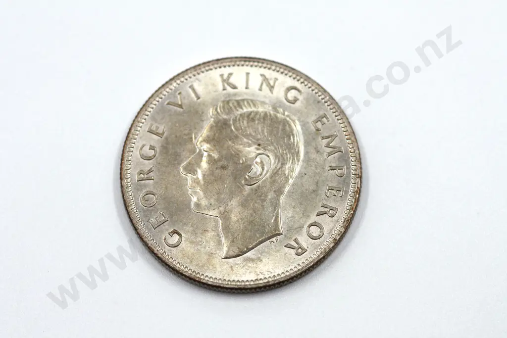 1937 halfcrown, uncirculated with mint lustre. C.V. $600 Image 1++