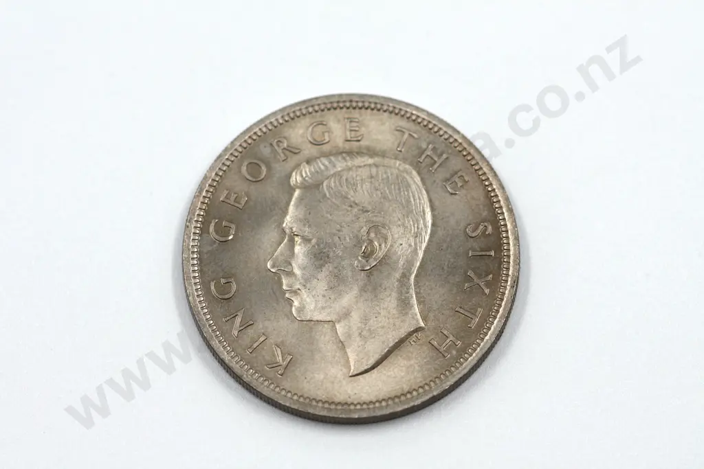 1950 halfcrown, die one, brilliant uncirculated with full mint lustre. C.V. $200 Image 1++