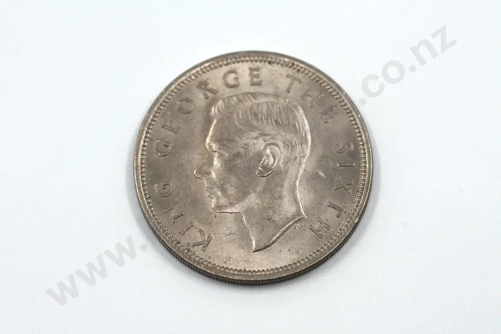 1951 halfcrown, uncirculated with mint lustre. C.V. $80 Image 1++