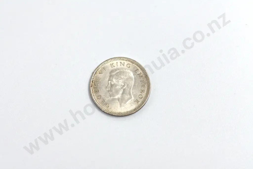 1942 ‘one dot’ threepence, extremely fine. C.V. $450 Image 1++