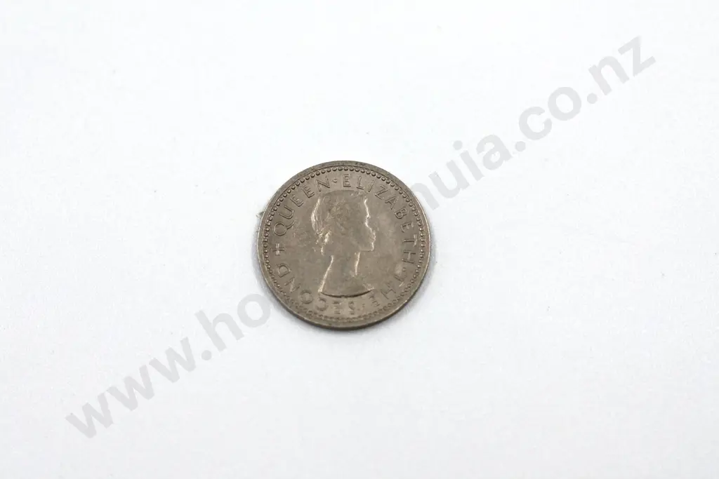 1956 ‘no shoulder strap’ threepence, extremely fine. C.V. $250 Image 1++