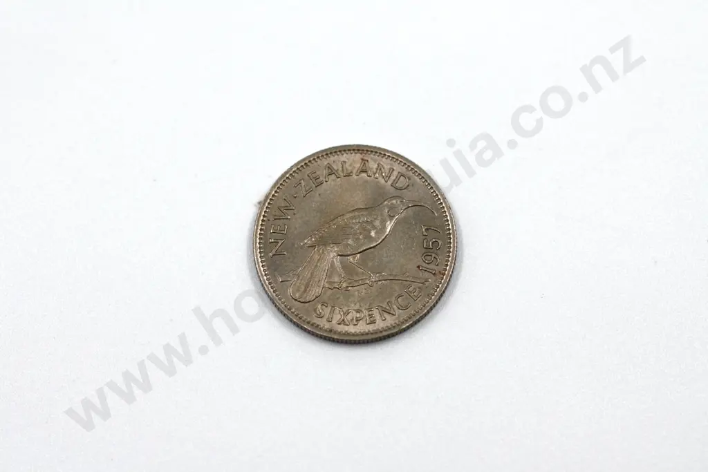 1957 ‘no shoulder strap’ sixpence, extremely fine. C.V. $250 Image 1++