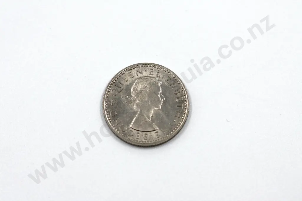 1965 ‘broken wing’ sixpence, almost uncirculated with lustre. C.V. $40 Image 1++