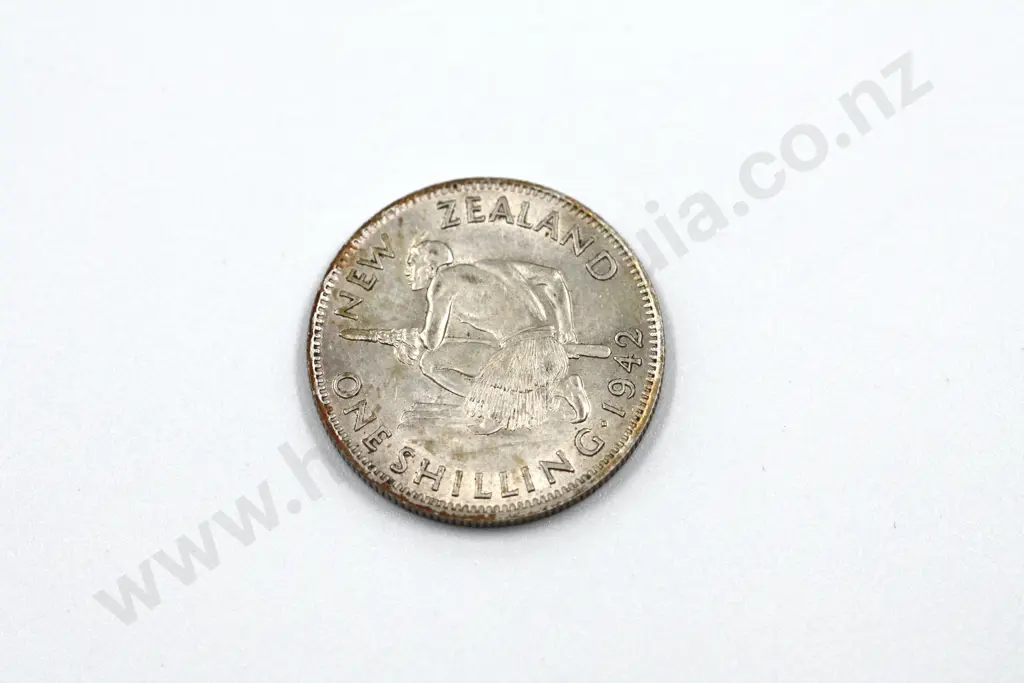 1942 ‘broken back’ shilling, very fine or better. C.V. $200 Image 1++