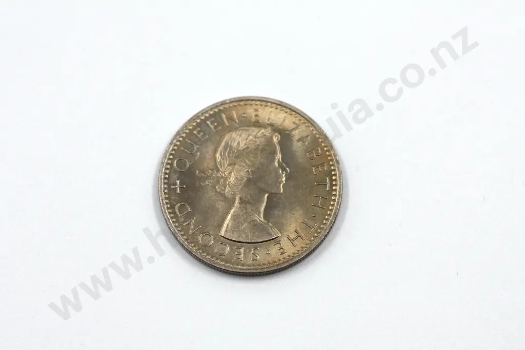 1965 ‘broken back’ shilling, brilliant uncirculated with full lustre. C.V. $250 Image 1++