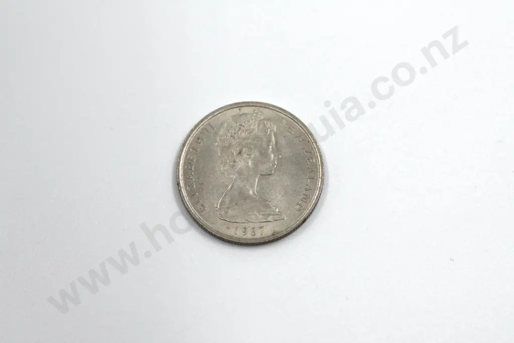 1967 ‘no sea to right’ five cents, almost uncirculated, estimated C.V. $60 Image 1++
