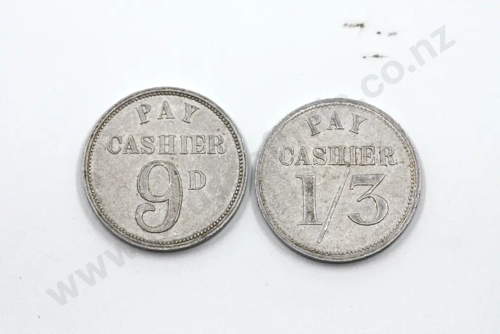 Icy-Kol 9 pence and 1 shilling and threepence Shampoo ( Barber’s ) aluminium tokens. Combined C.V. $100 Image 1++