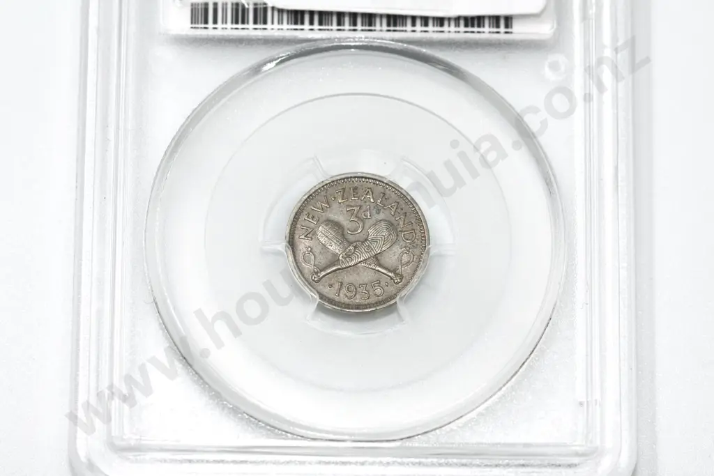 1935 threepence, cleaning, AU details. C.V. extremely fine $1000, almost uncirculated $1800 Image 1++