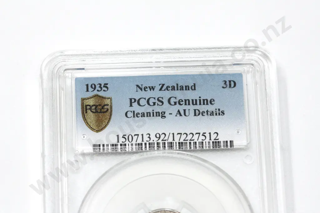1935 threepence, cleaning, AU details. C.V. extremely fine $1000, almost uncirculated $1800 Image 1++