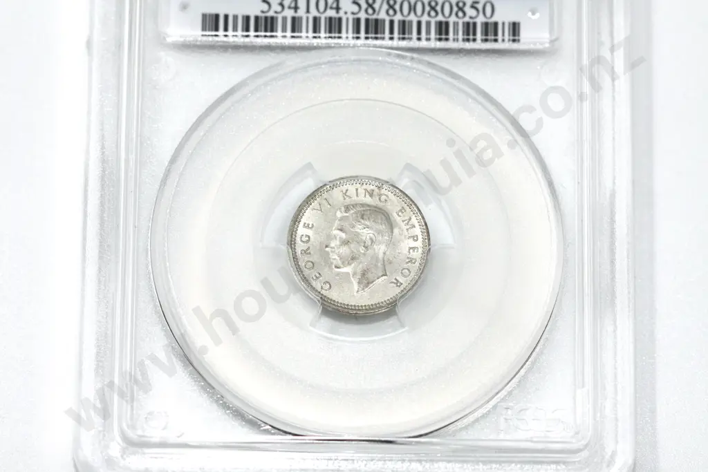 1941 threepence, AU 58. C.V. $400 Image 1++