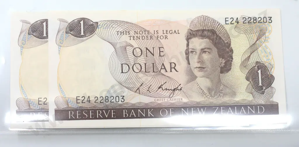 One dollar, consecutively numbered pair, Knight signature, last prefix of the signature, almost uncirculated.  Image 1++