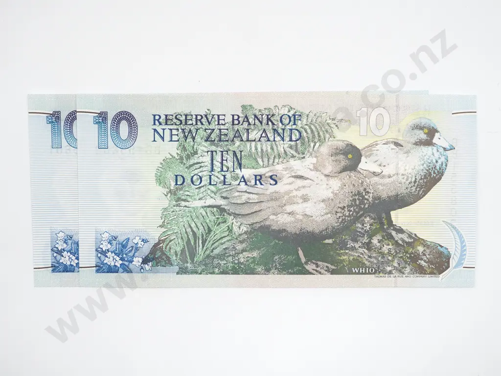 Ten dollars, consecutively numbered pair, Brash signature, type III, uncirculated. Combined C.V. $120 Image 1++