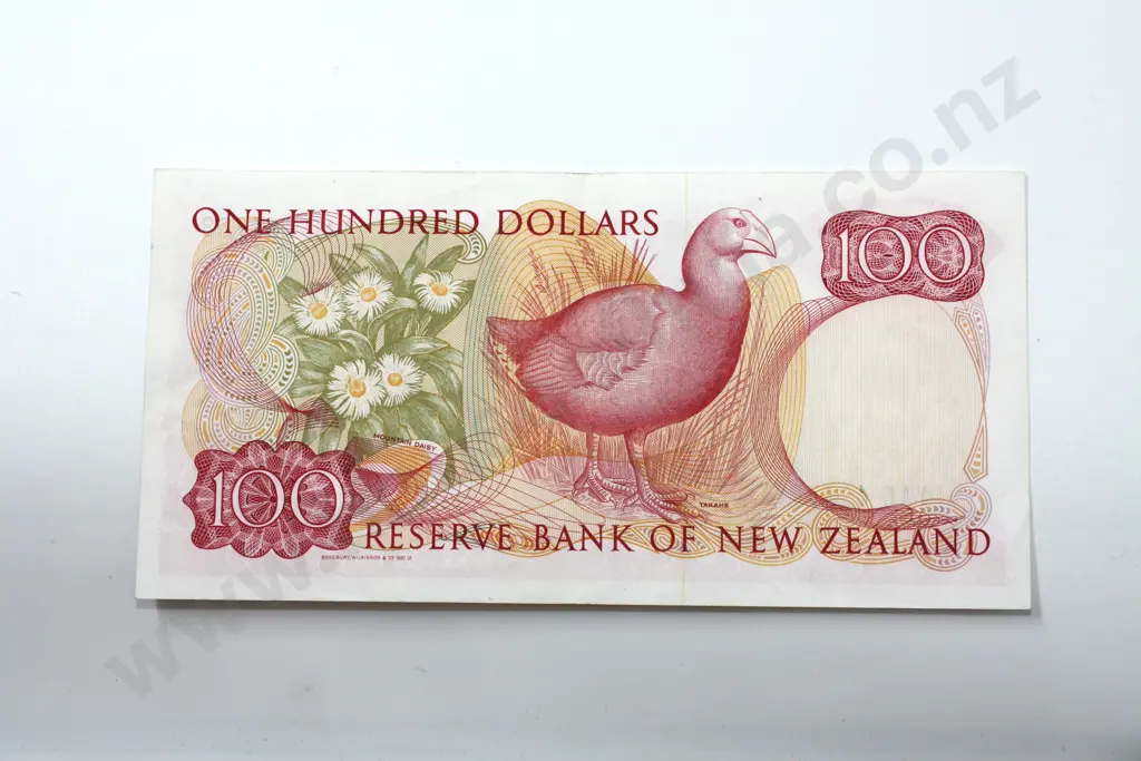 One hundred dollars, Russell signature, very fine. C.V. $350 Image 1++