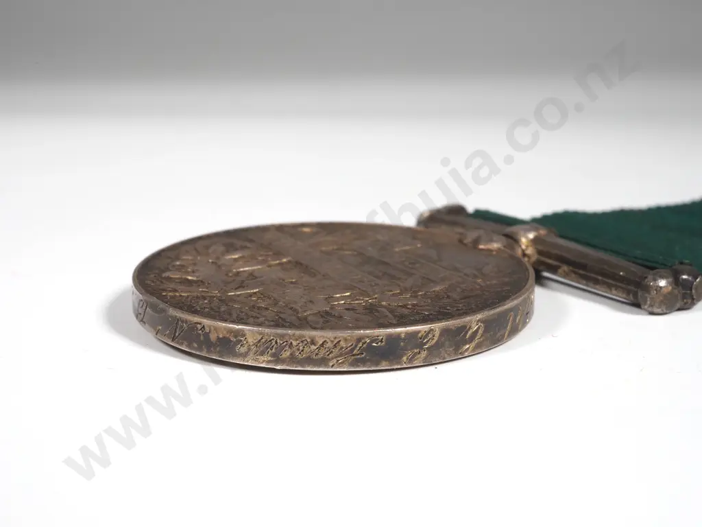 English Volunteer Long Service Medal to Corporal E E Smith. No.13 Image 1++
