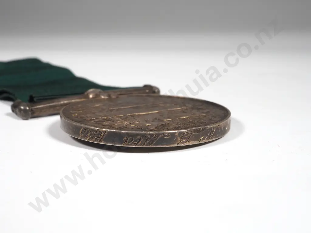 English Volunteer Long Service Medal to Corporal E E Smith. No.13 Image 1++