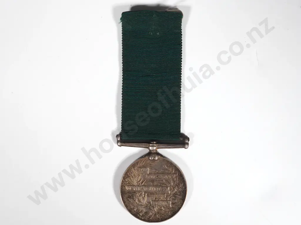 English Volunteer Long Service Medal to Corporal E E Smith. No.13 Image 1++