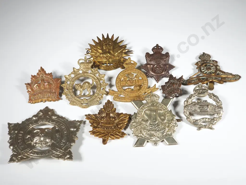 Assorted lot of Canadian WW1/2 Cap Badges Image 1++