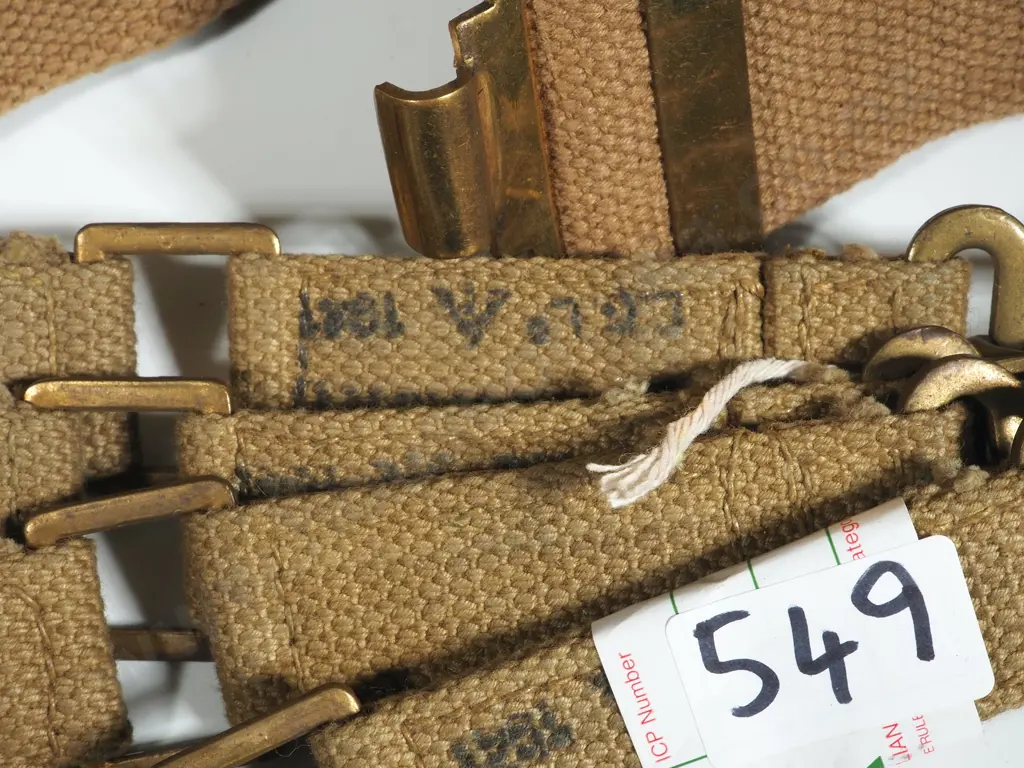Two Reproduction Webbing Belts & Four 1941 Dated Brace Attachements Image 1++